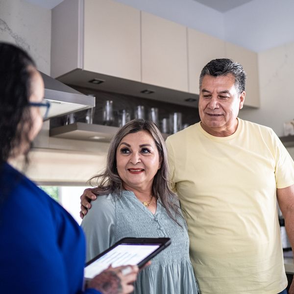 Couple meeting with energy contractor